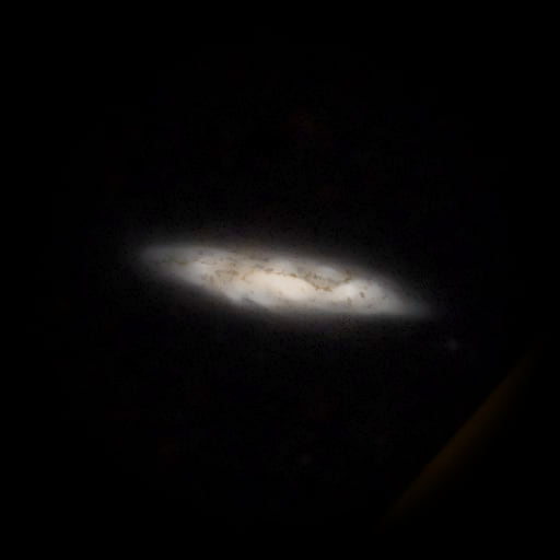 Survey photograph of Surfboard Galaxy: 15′ of sky, north up and east to the left, with the stars around it taken out