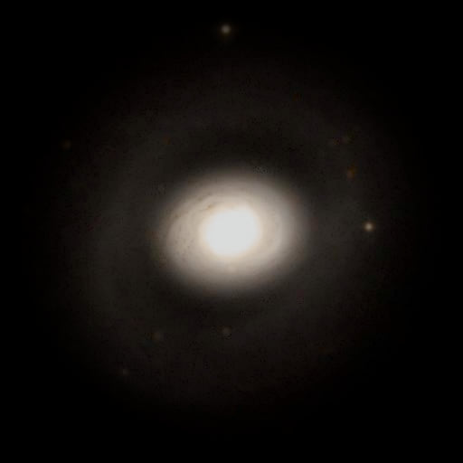 Survey photograph of Croc's Eye Galaxy: 19′ of sky, north up and east to the left, with the stars around it taken out